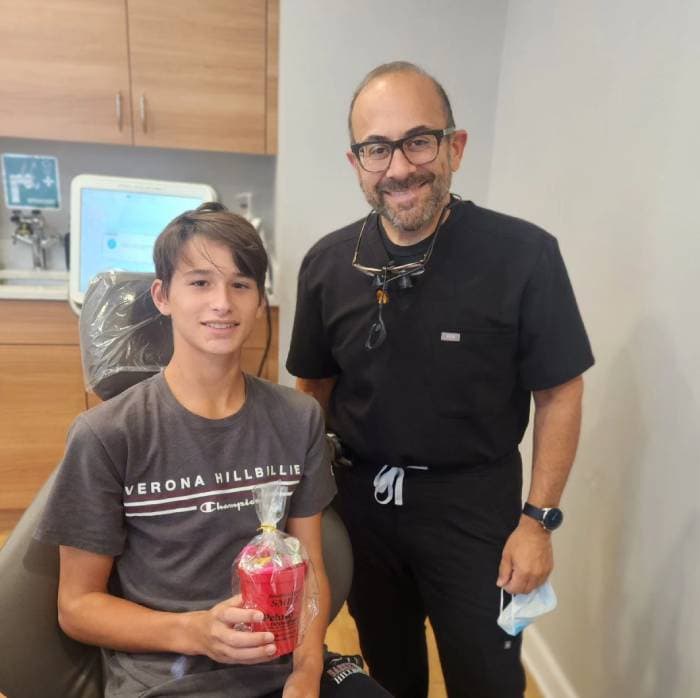 Dr. Peluso and his kid patient