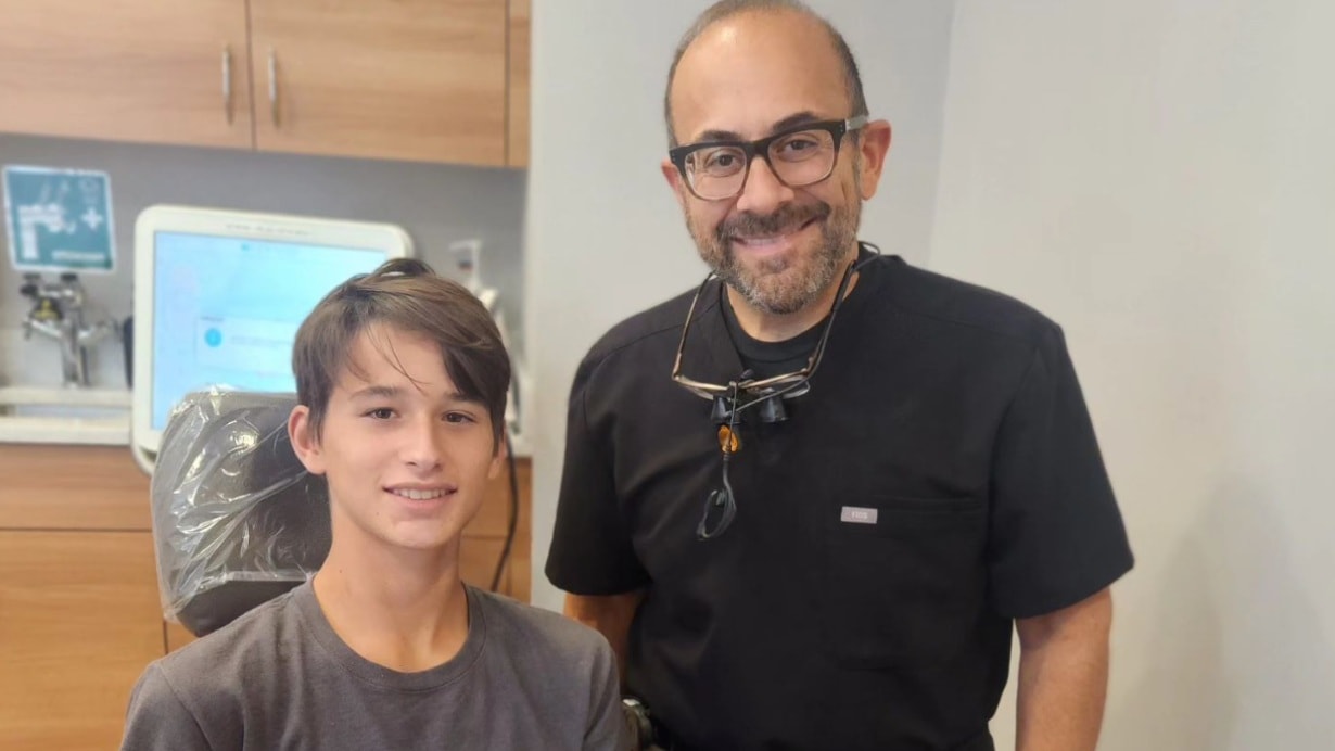 Dr. Peluso and his kid patient