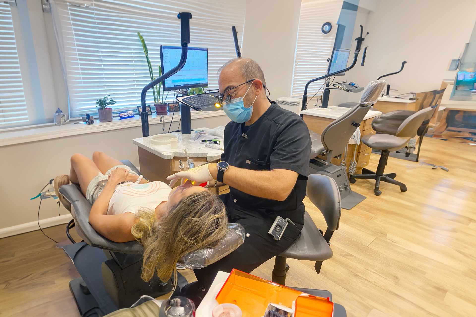 Dr. Peluso works closely with a kids patient