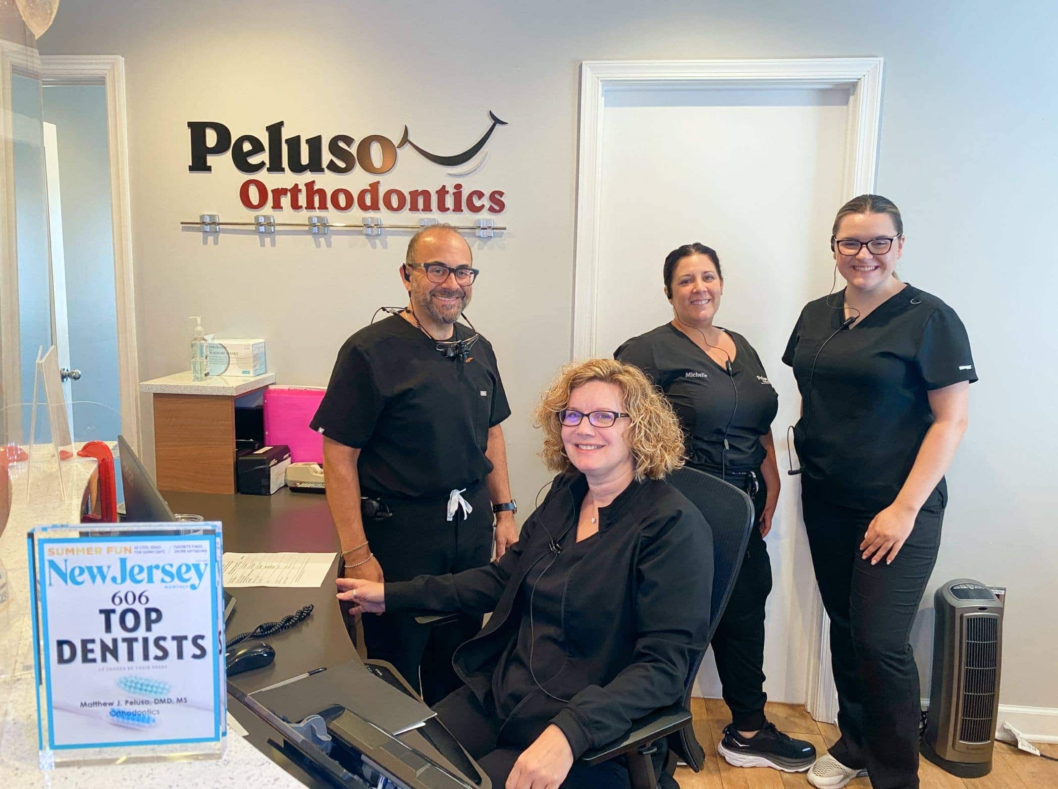 Dr. Peluso with his teammates